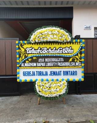 Papan Bunga Duka di Jayaraksa